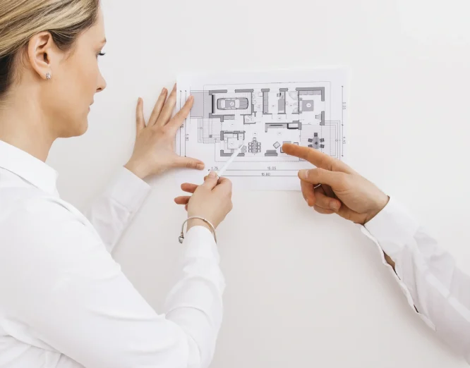 young-female-architect-designer-working-blueprint-project-new-apartments-min (1)